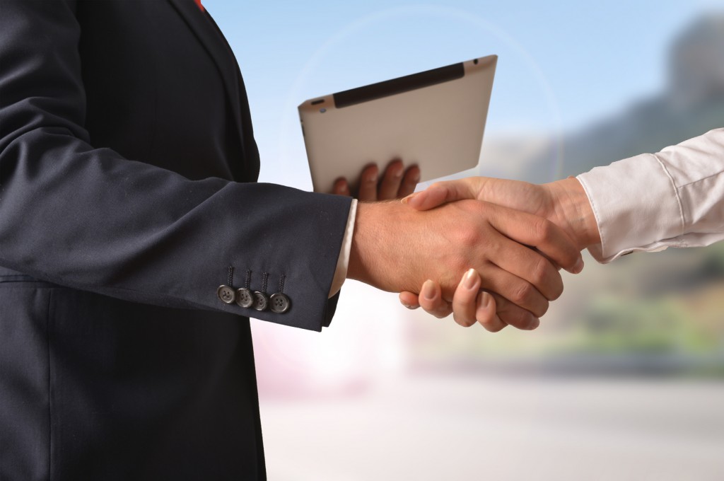 Erfolg im Business Handshake